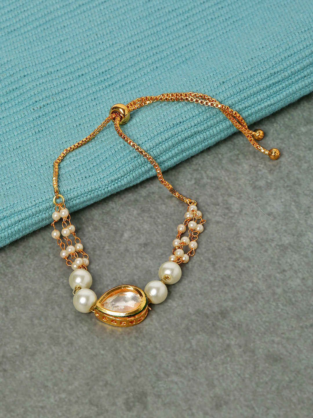 

Yellow Chimes Women Gold-Toned Handcrafted Pearl Bracelet