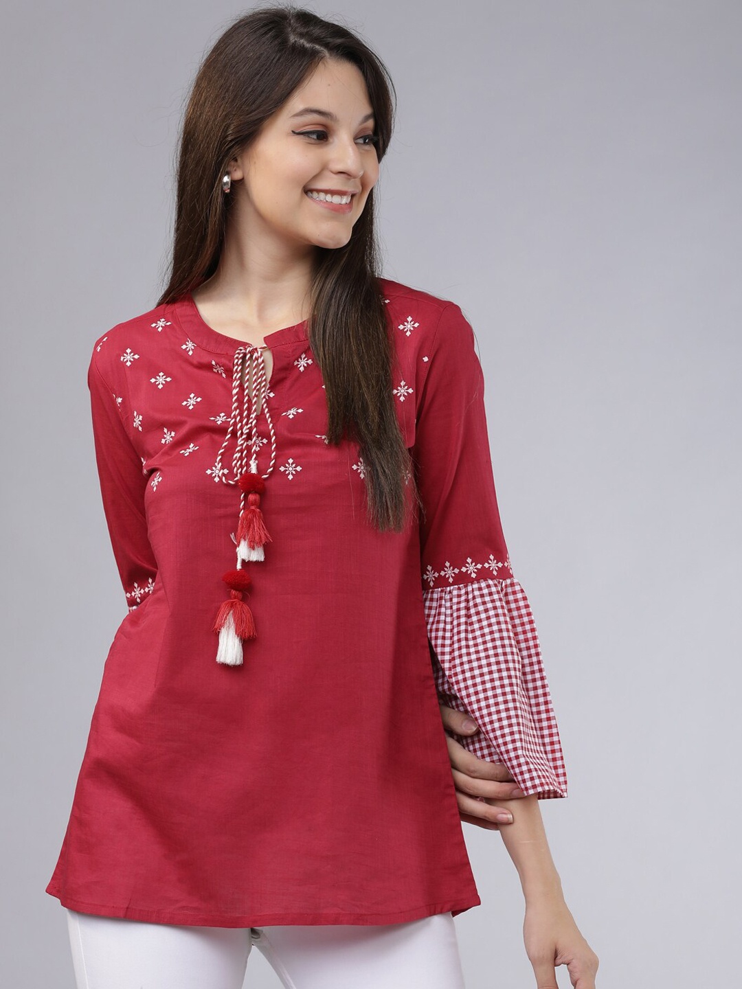 

Vishudh Women Red Embroidered Tie-Up Neck Longline Pure Cotton Top