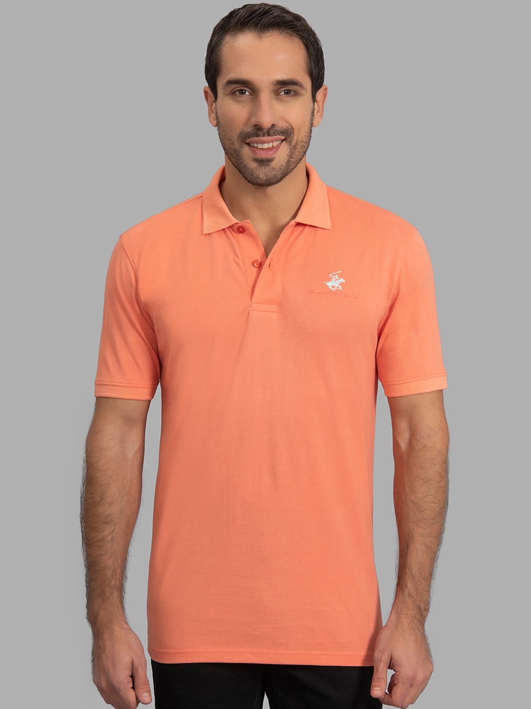

Beverly Hills Polo Club Men Orange Solid Polo Collar T-shirt
