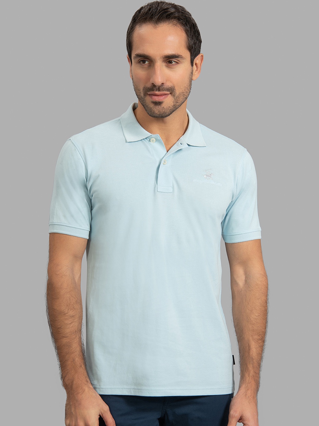 

Beverly Hills Polo Club Men Blue Solid Polo Collar T-shirt