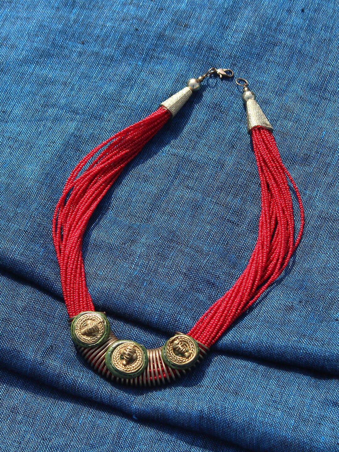 

ExclusiveLane Gold-Tone & Red Multistrand Beaded Handcrafted Dhokra Art Necklace