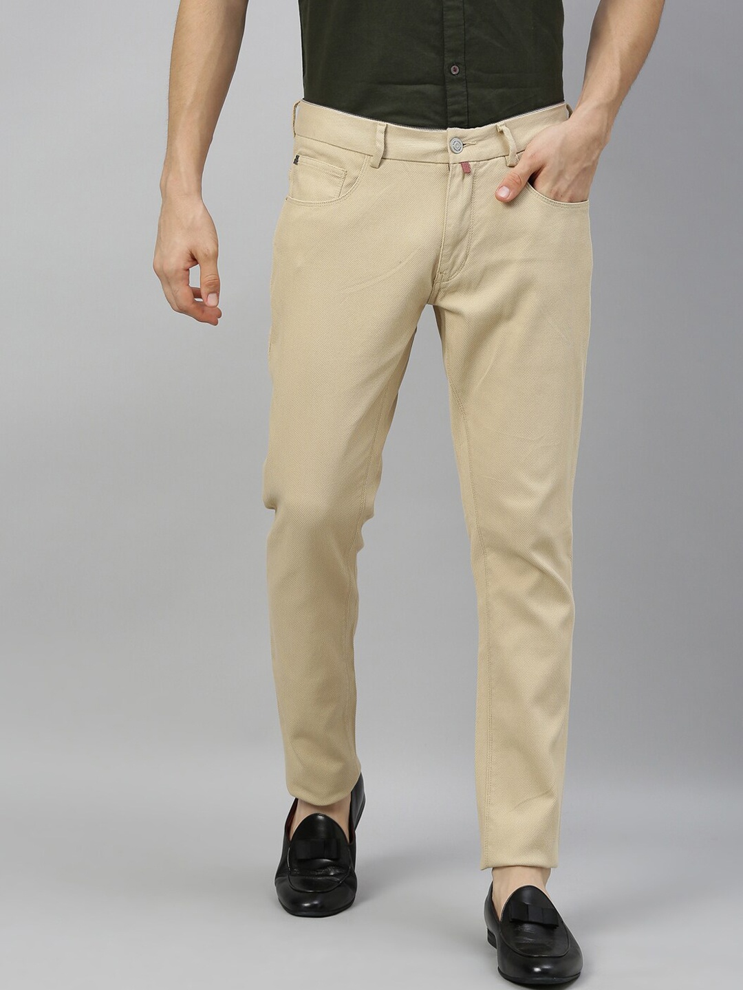 

RARE RABBIT Men Beige Self Design Regular Trousers
