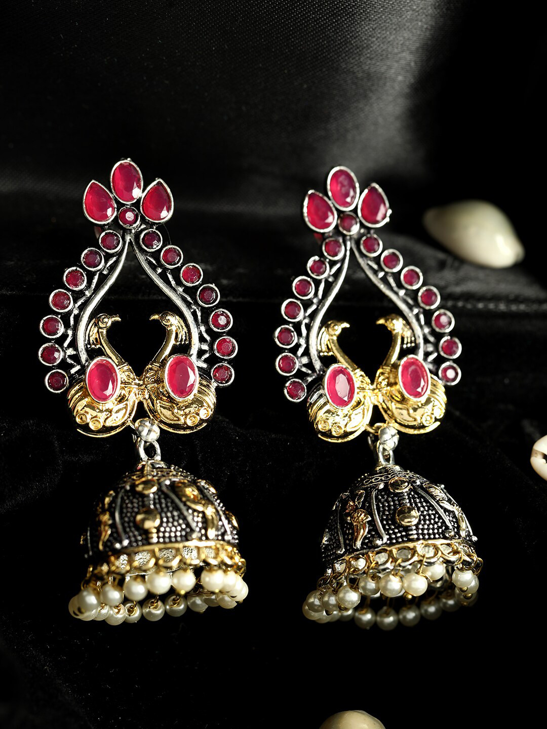 

ANIKAS CREATION Gold-Plated & Magenta Antique Peacock Shaped Jhumkas