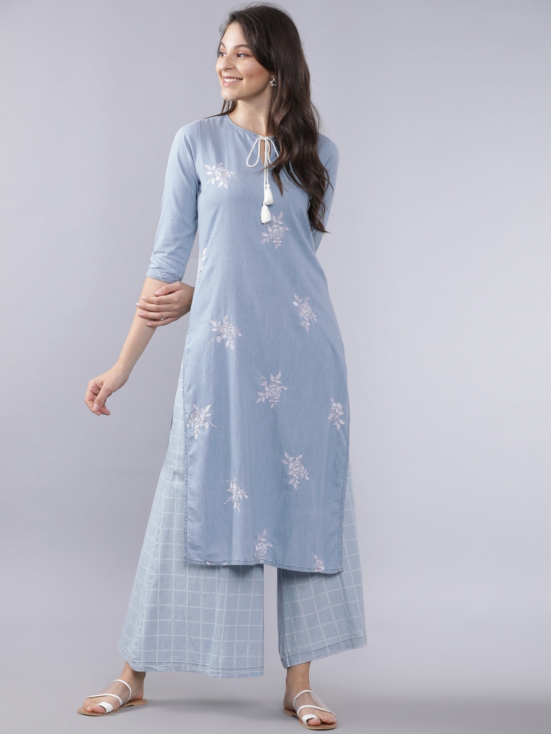 

Vishudh Women Blue & White Solid Kurta with Palazzos