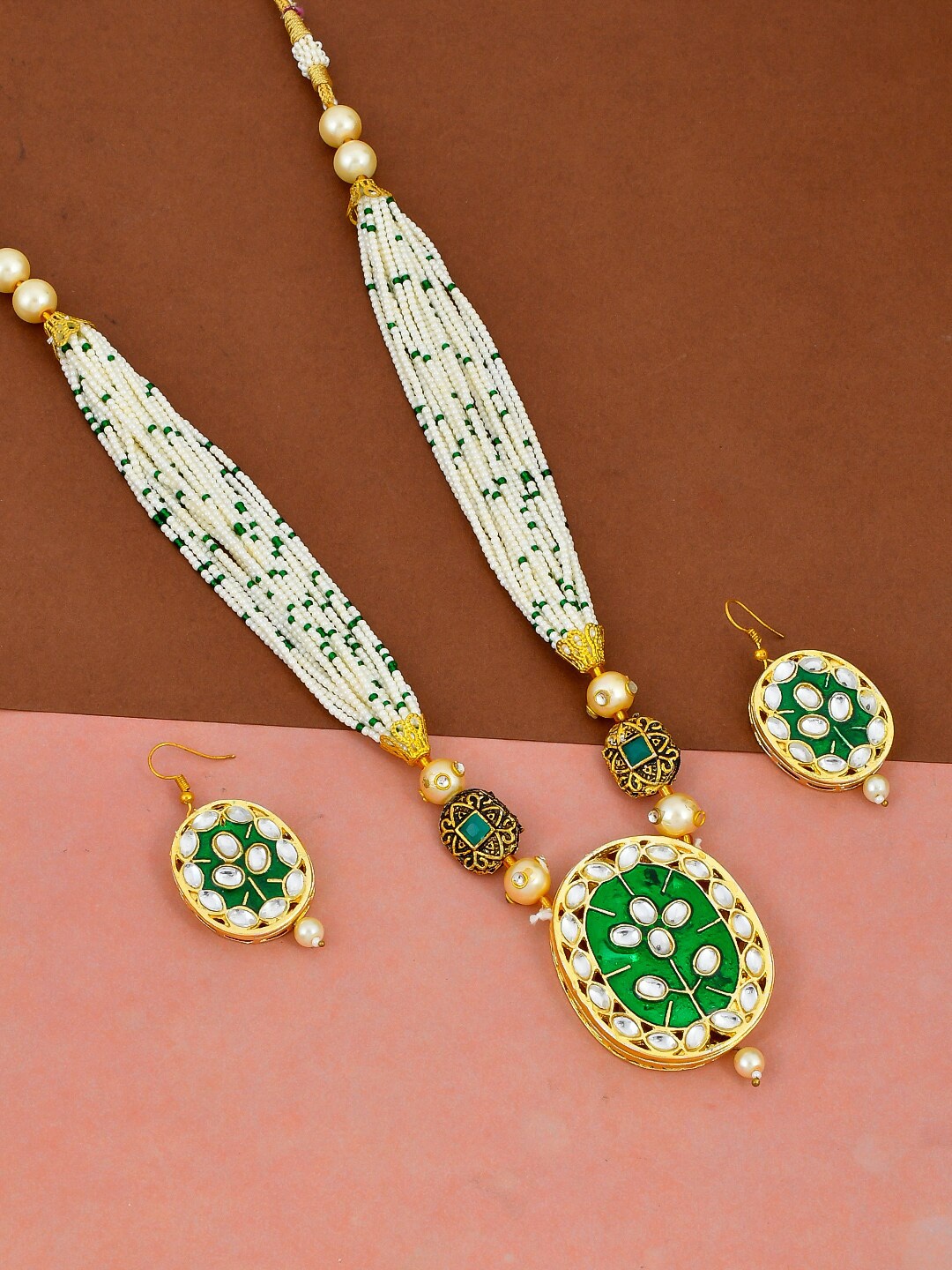 

Silvermerc Designs Women Gold-Plated & Green Pearl Studded Oval-Shaped Jewellery Set