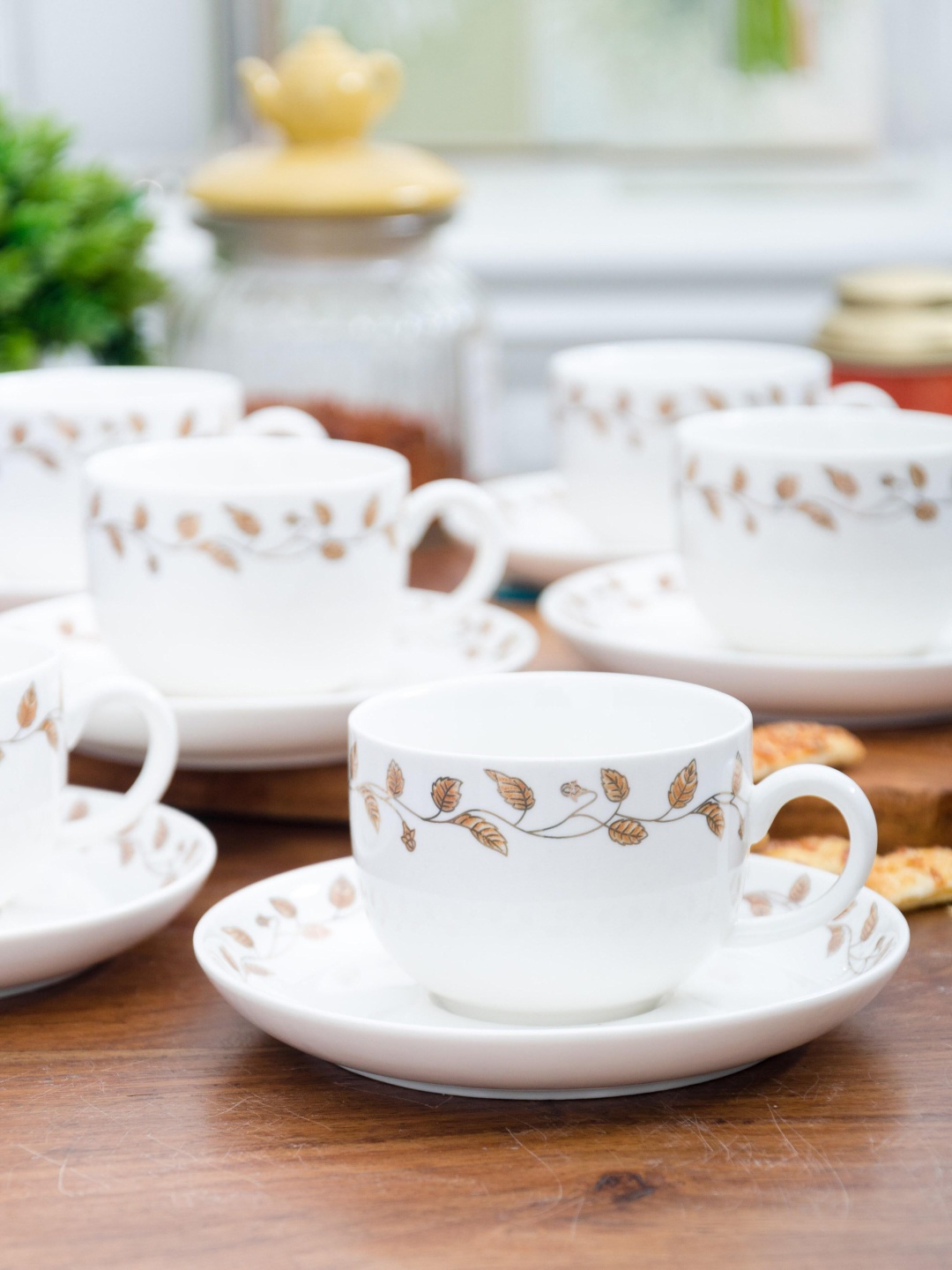 

White Gold 12 Pieces White & 24 K Gold Printed Porcelain Cups and Saucers Set