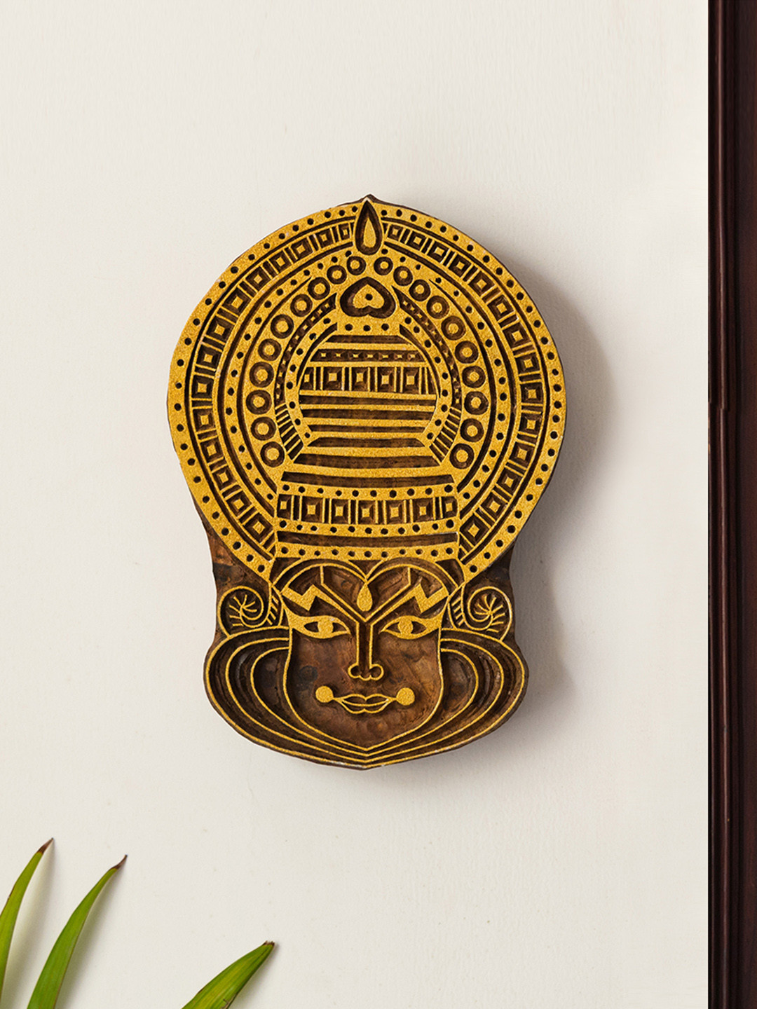 

ExclusiveLane Yellow & Brown Kathakali Maquillage Hand Carved Block Wooden Wall Hanging