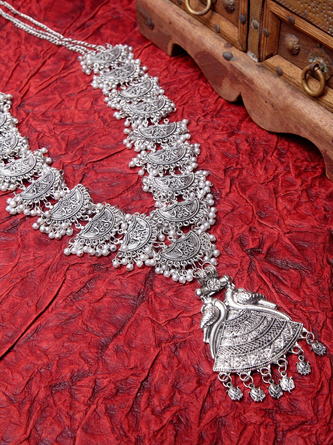 

Moedbuille Silver & White German Silver Filigree Peacock Shaped Necklace