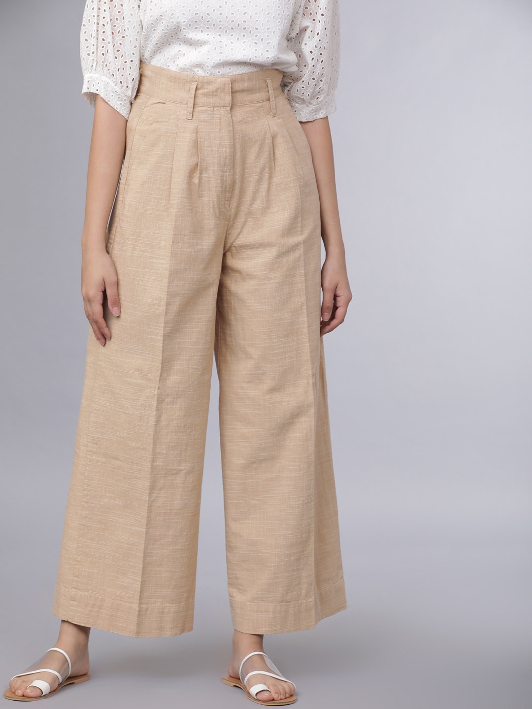 

Tokyo Talkies Women Beige Regular Fit Self Design Parallel Trousers