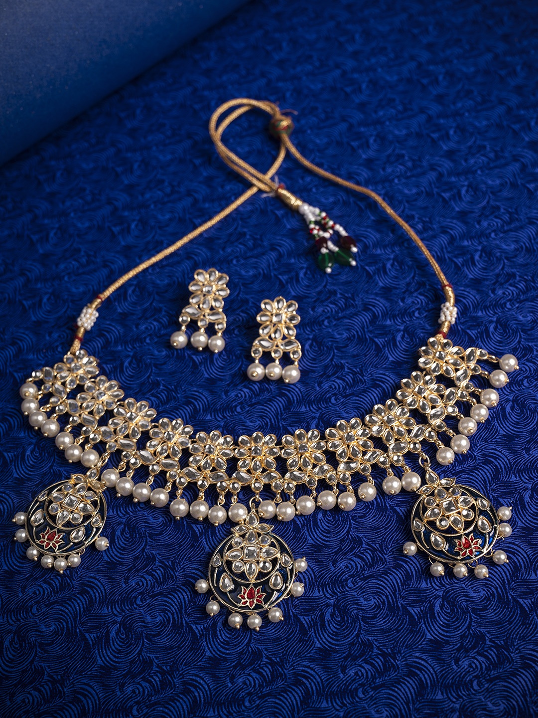 

Shoshaa Gold-Plated White & Blue Kundan Studded Meenakari Jewellery Set