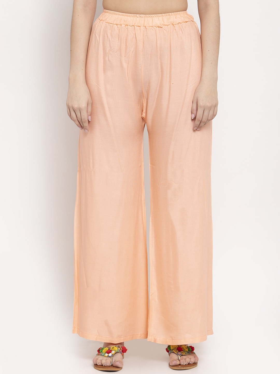 

TAG 7 Women Orange Solid Flared Palazzos