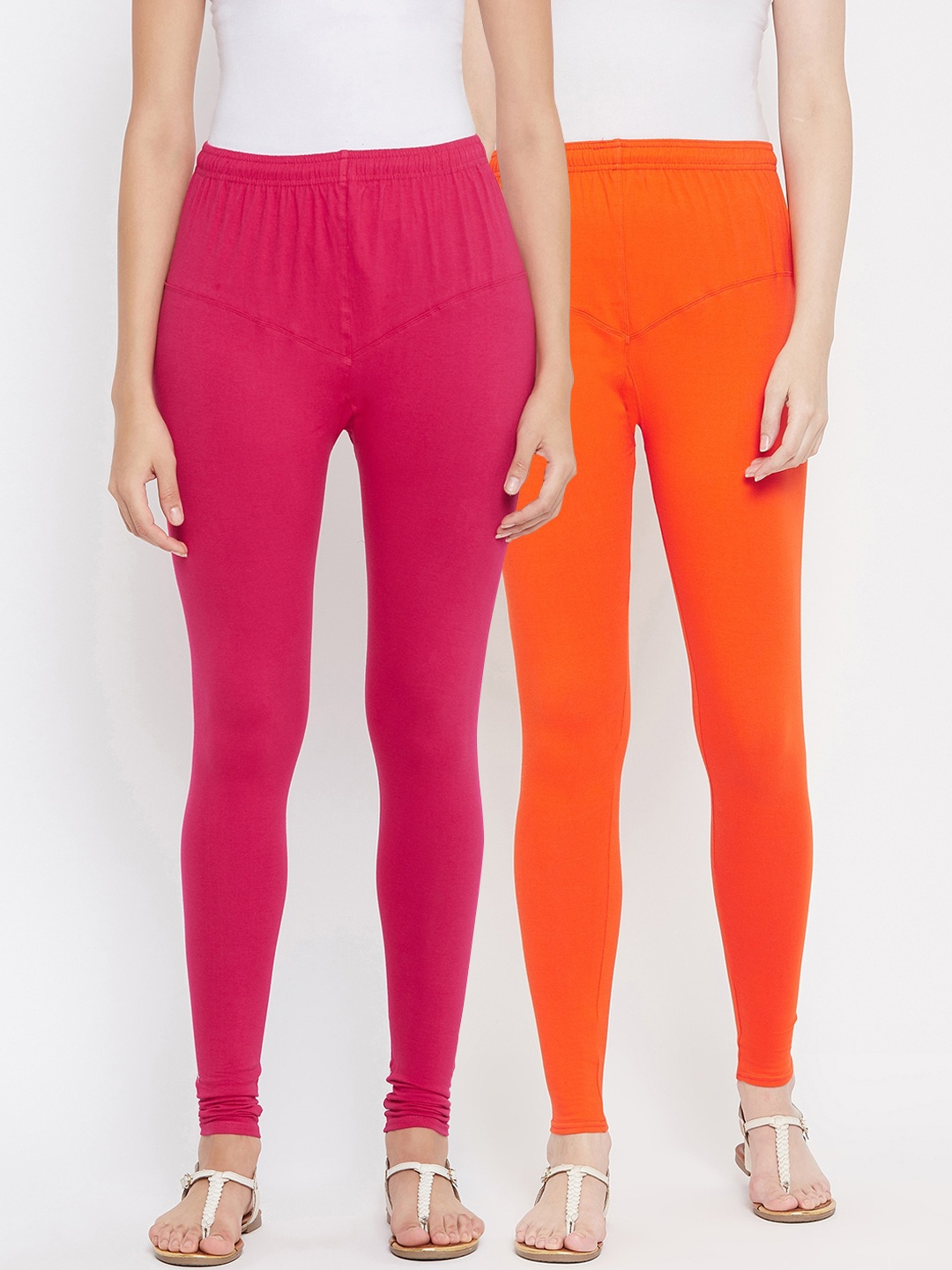 

Tulsattva Women Pack Of 2 Orange & Fuchsia Pink Solid Leggings