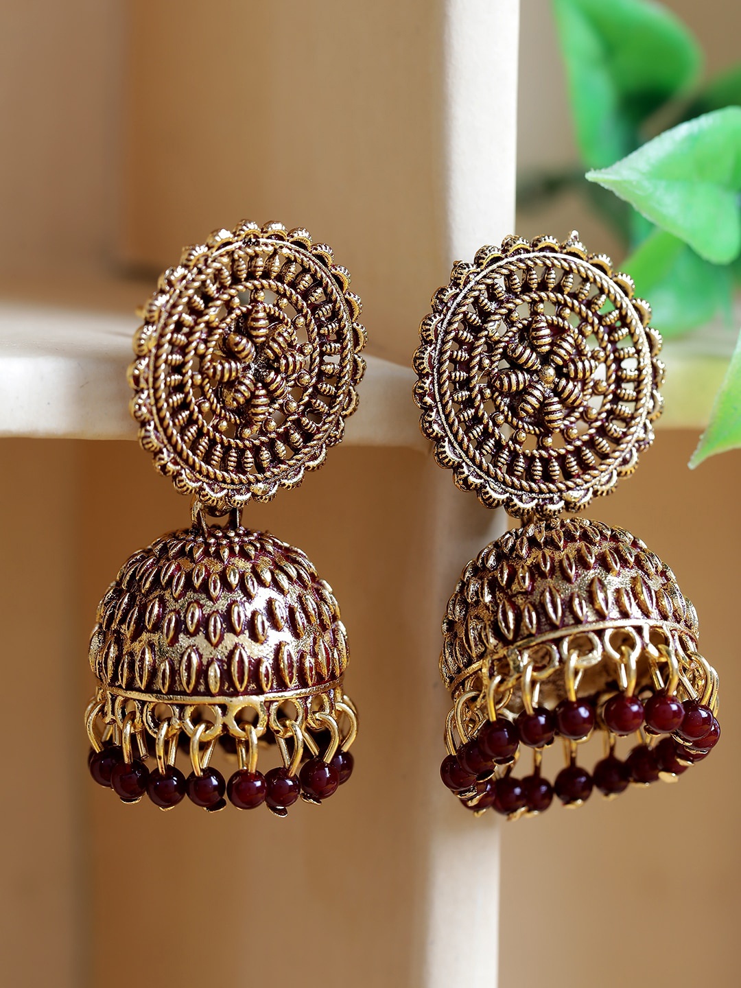 

ANIKAS CREATION Maroon & Gold-Plated Dome Shaped Jhumkas