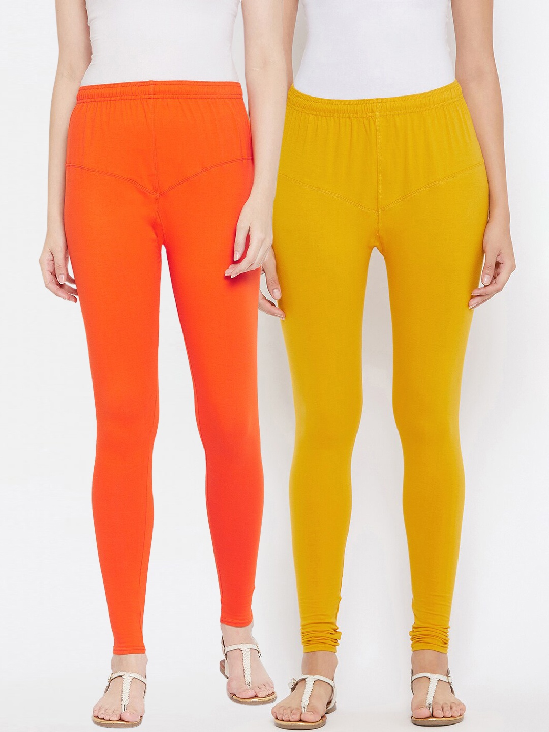 

Tulsattva Women Pack Of 2 Solid Churidar-Length Leggings, Orange