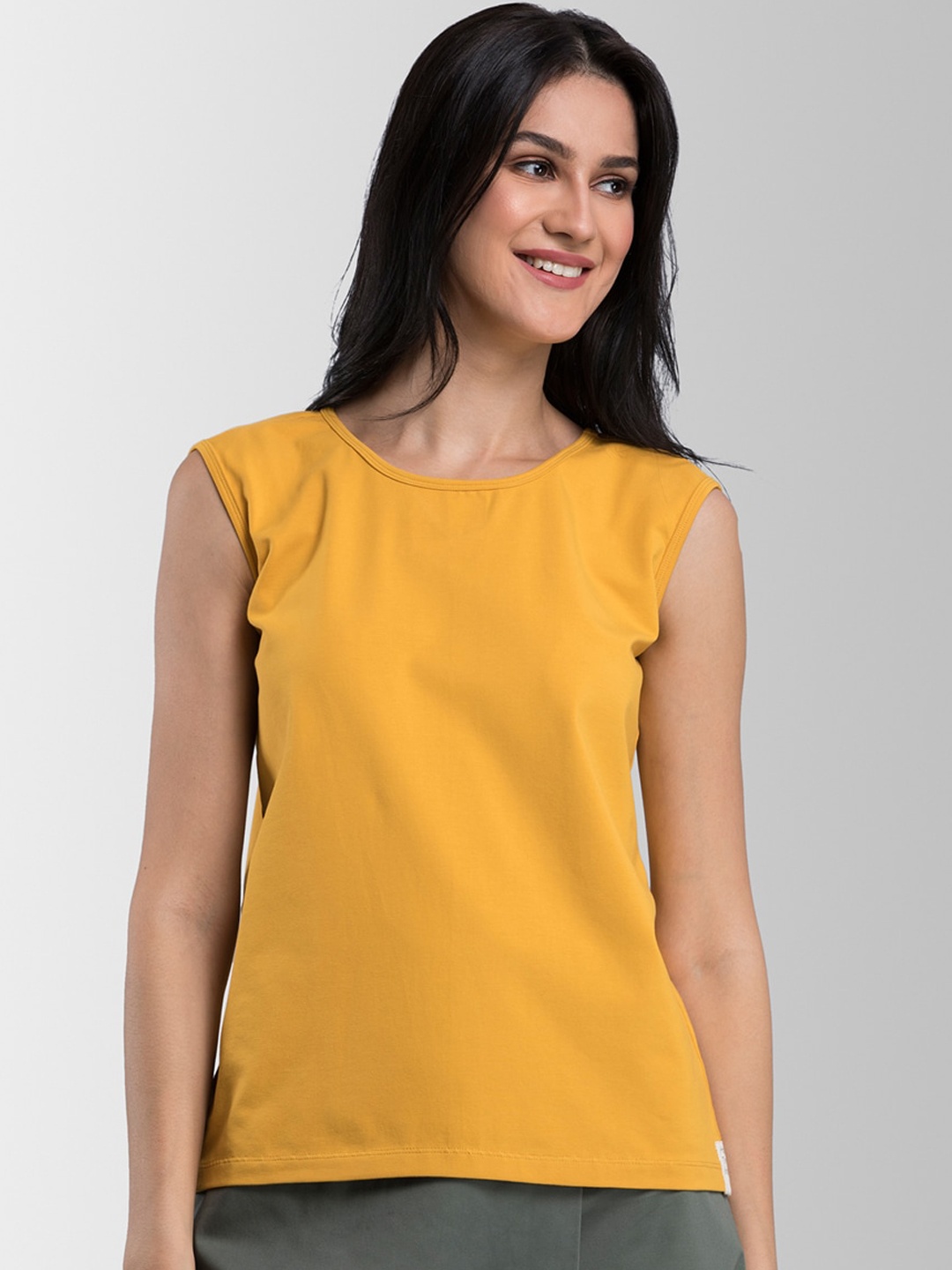

FableStreet Women Mustard Yellow Solid Round Neck T-shirt