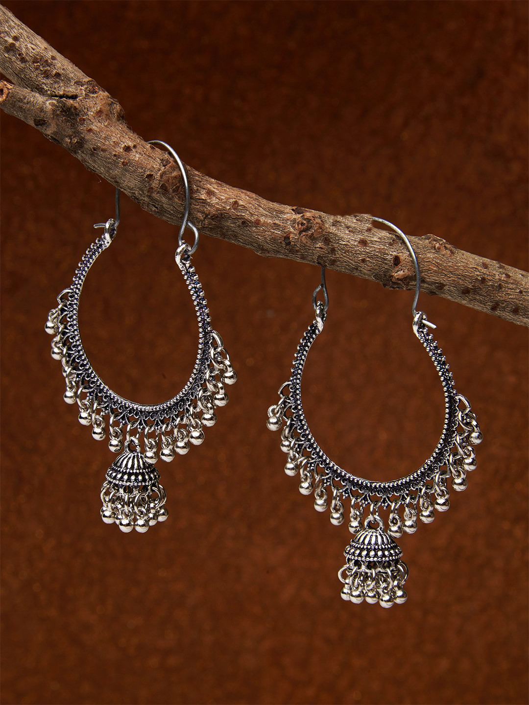 

Fida Silver-Toned Crescent Shaped Drop Earrings