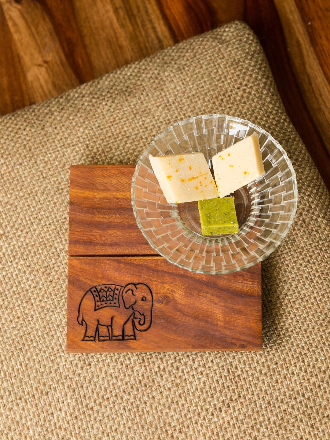ExclusiveLane Brown Sheesham Wooden The Elephant Warriors Hand Carved Trivet
