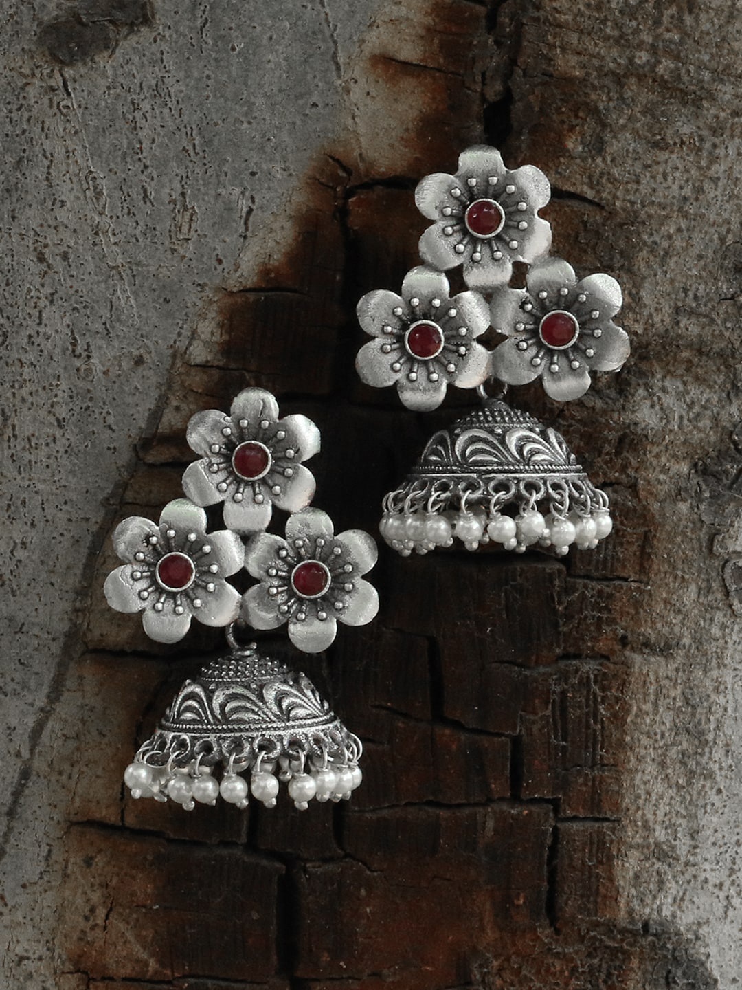 

Adwitiya Collection Oxidised Silver-Plated Floral Jhumkas