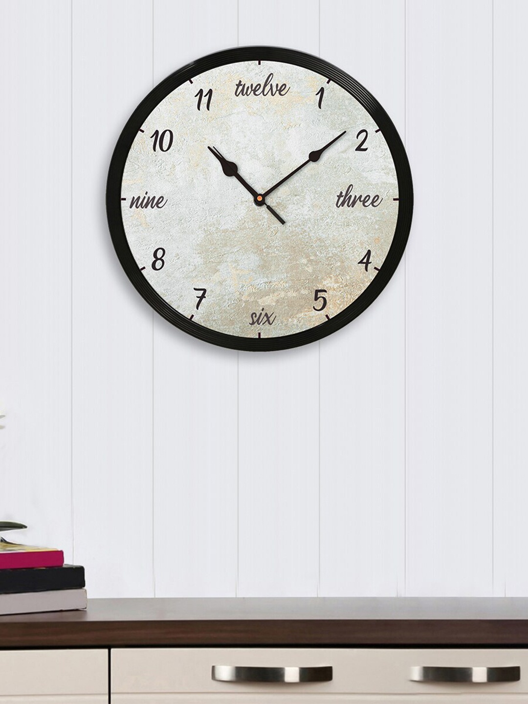 

eCraftIndia Cream-Coloured Round Textured 31cm Analogue Wall Clock