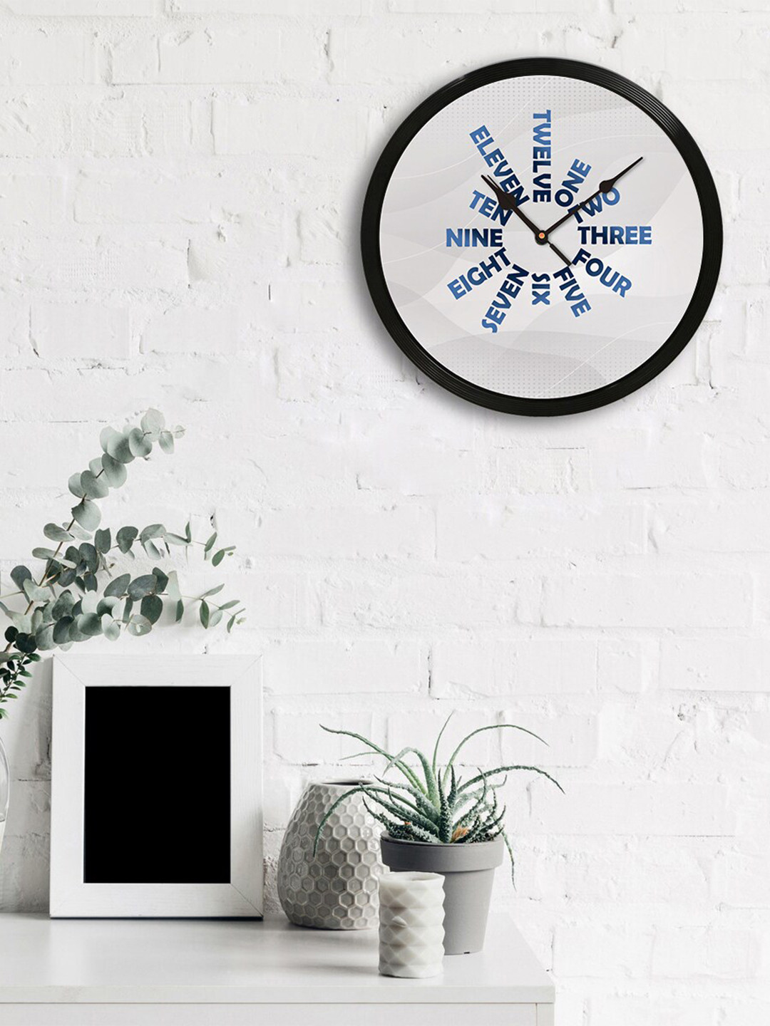 

eCraftIndia Off-White Round Printed 31cm Analogue Wall Clock