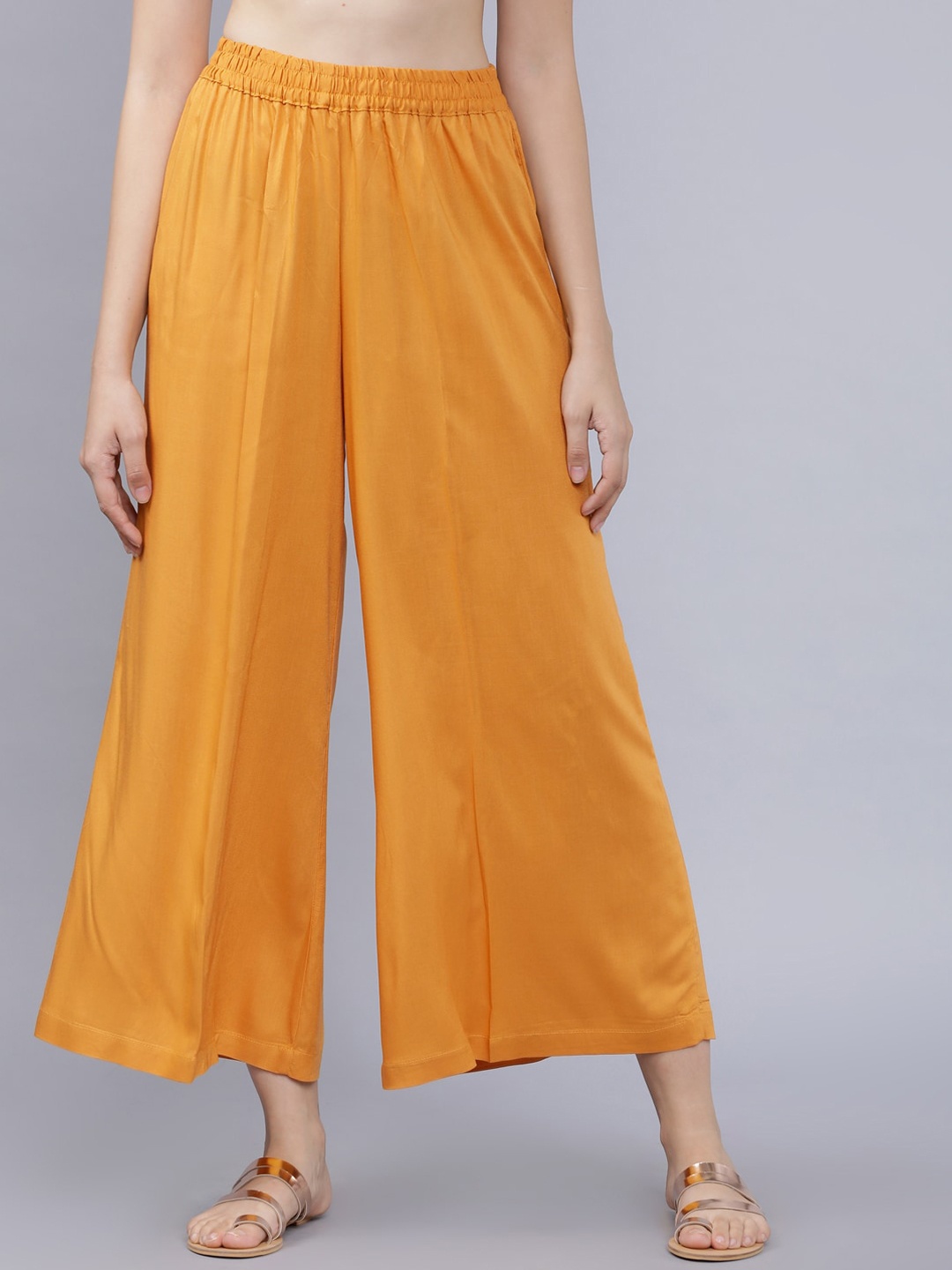 

Vishudh Women Mustard Yellow Solid Crop Wide Leg Palazzos