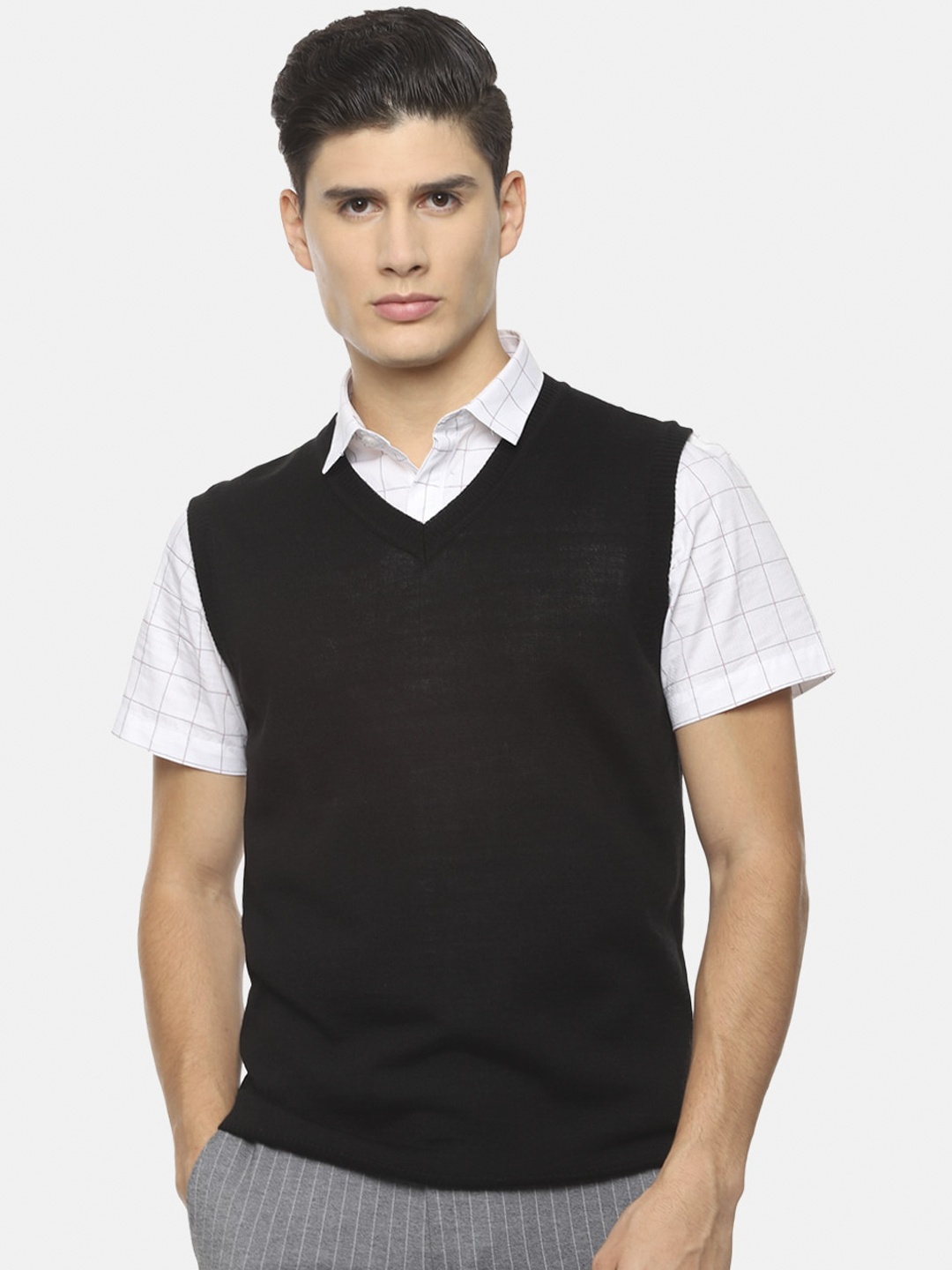 

Van Heusen Men Black Solid Acrylic Sweater Vest