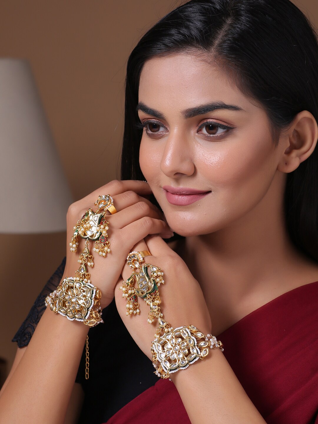 

Shoshaa Gold-Plated Brass Handcrafted Kundan Haathphool
