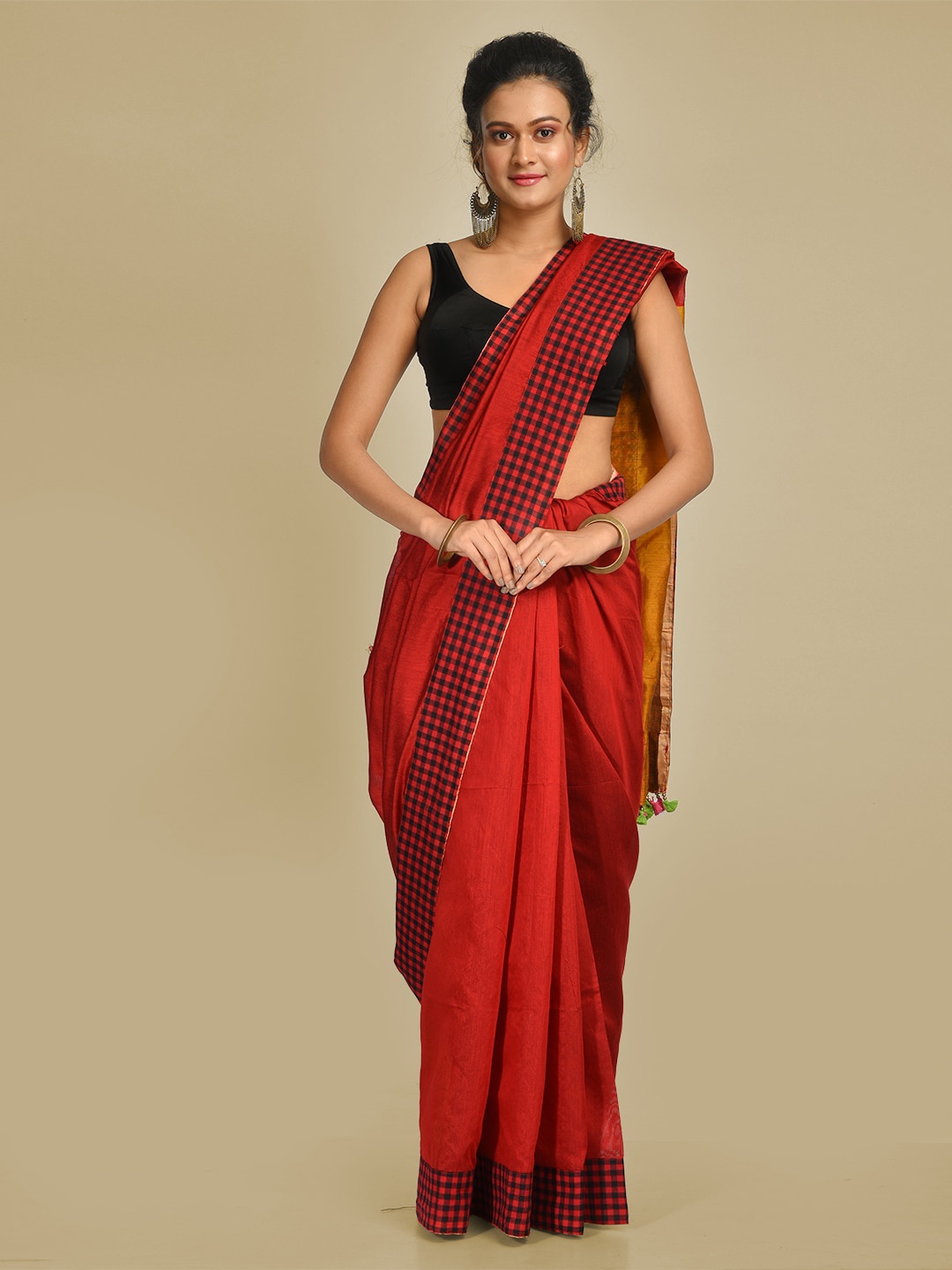 

Mitera Maroon Solid Cotton Blend Handloom Saree