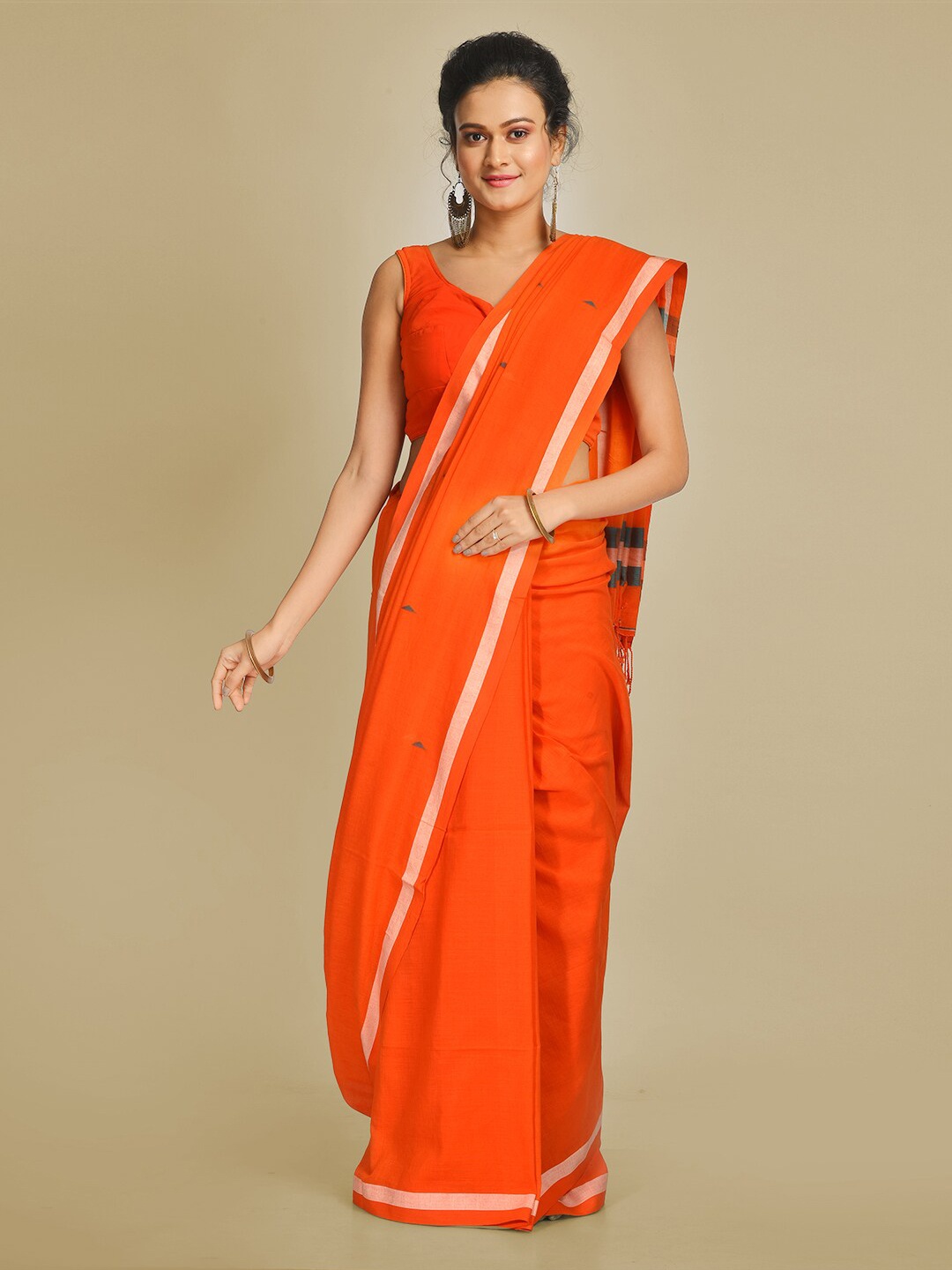 

Mitera Orange Pure Cotton Solid Handloom Taant Saree