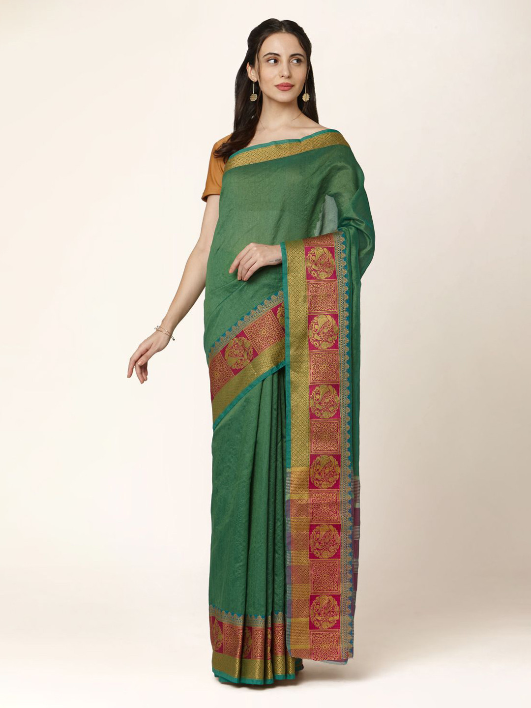 

Mitera Green & Pink Solid Saree