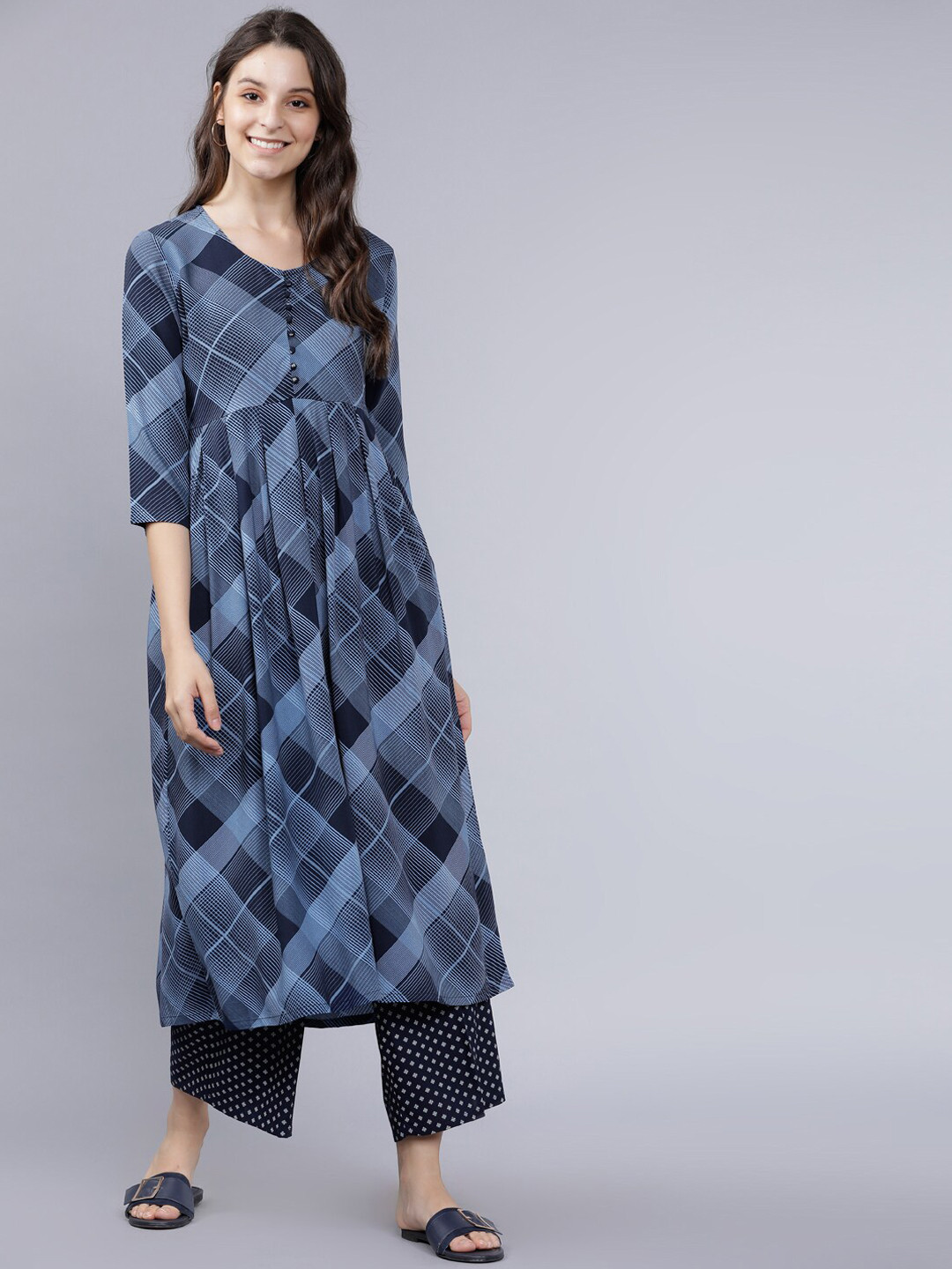 

Vishudh Women Navy Blue Printed Kurta with Palazzos
