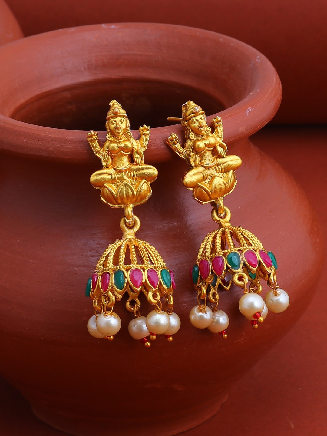 

Sukkhi Pink Gold Plated Handcrafted Dome Shaped Jhumkas