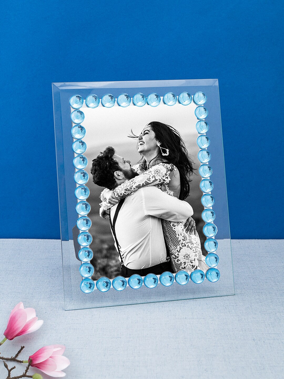 

Golden Peacock Transparent & Blue Stone-Studded Table-Top Photo Frame