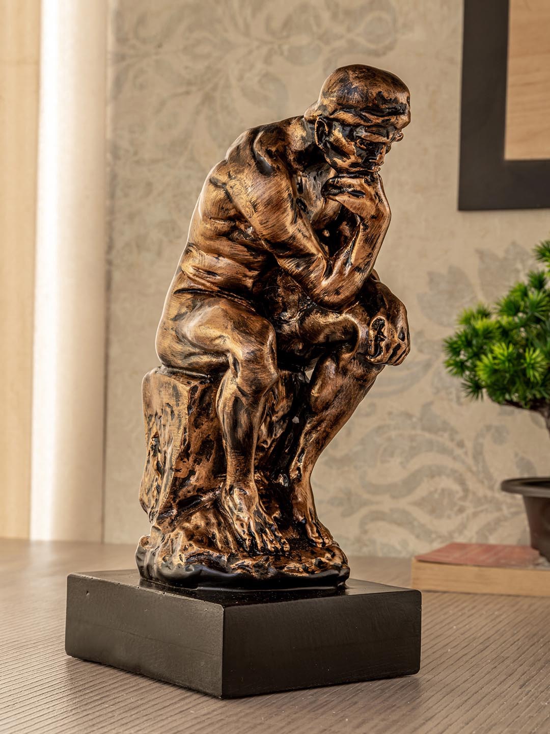 

TIED RIBBONS Copper-Toned & Black Thinking Man Sculpture