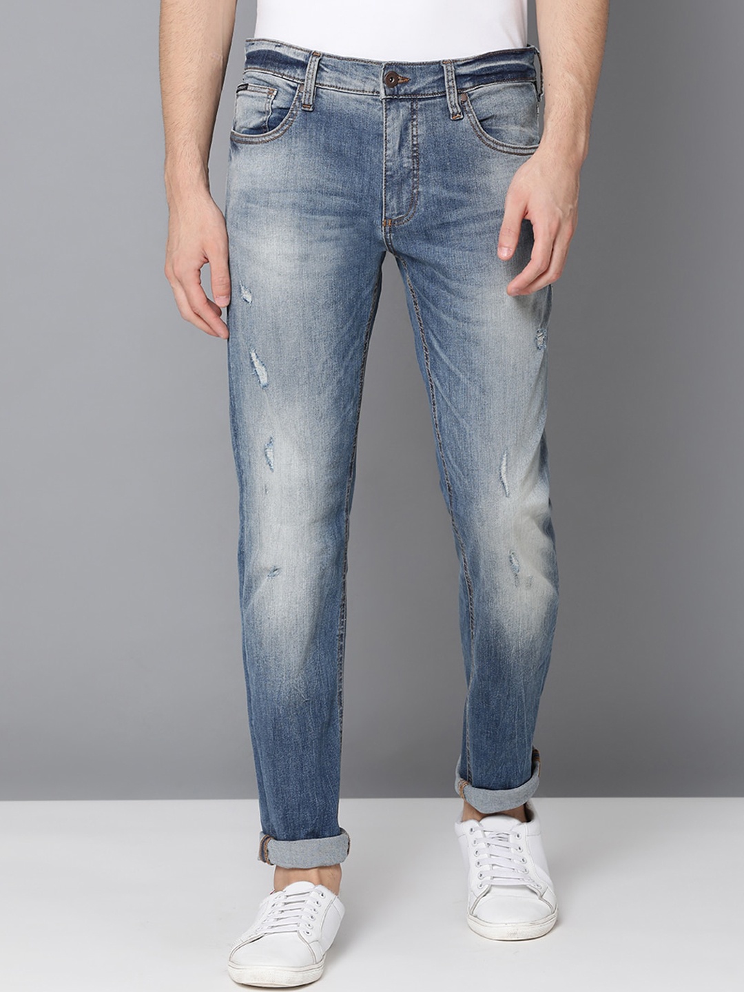 

LINDBERGH Men Blue Tapered Fit Mid-Rise Low Distress Stretchable Jeans