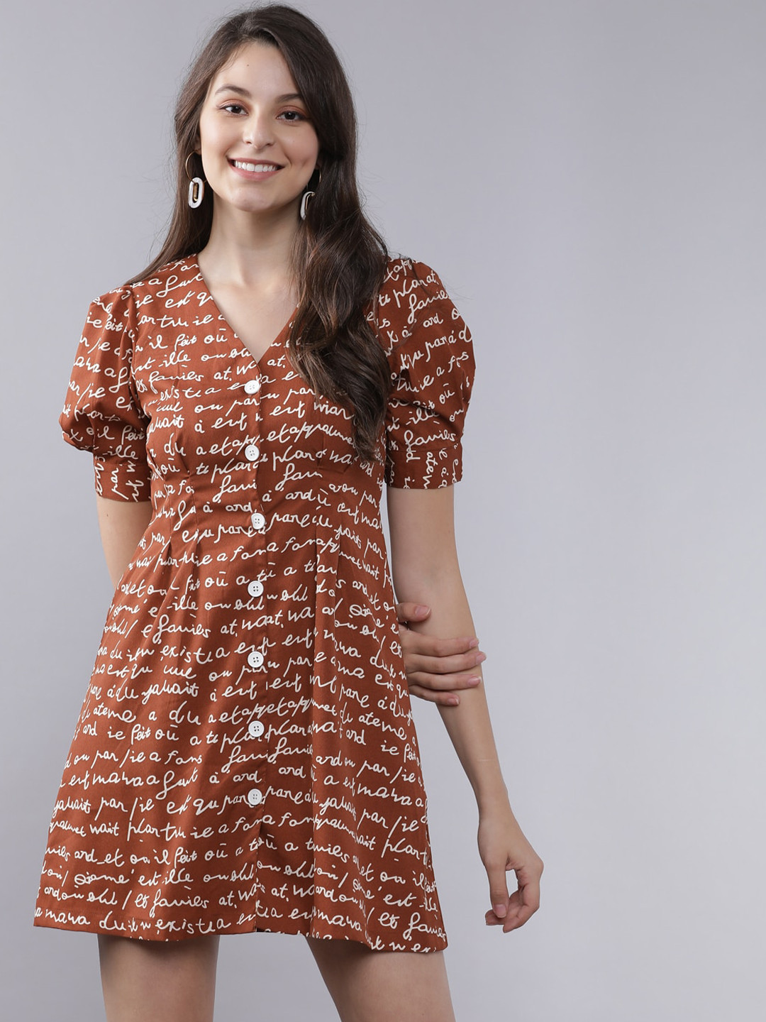 

Tokyo Talkies Women Brown Printed Fit and Flare Dress