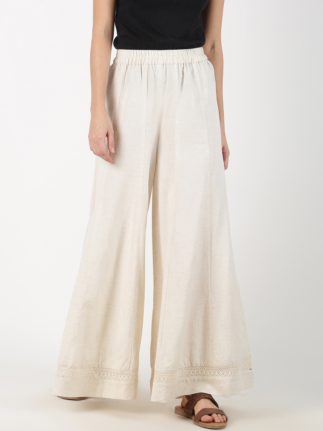 

Saffron Threads Women Off-White Solid Flared Palazzos