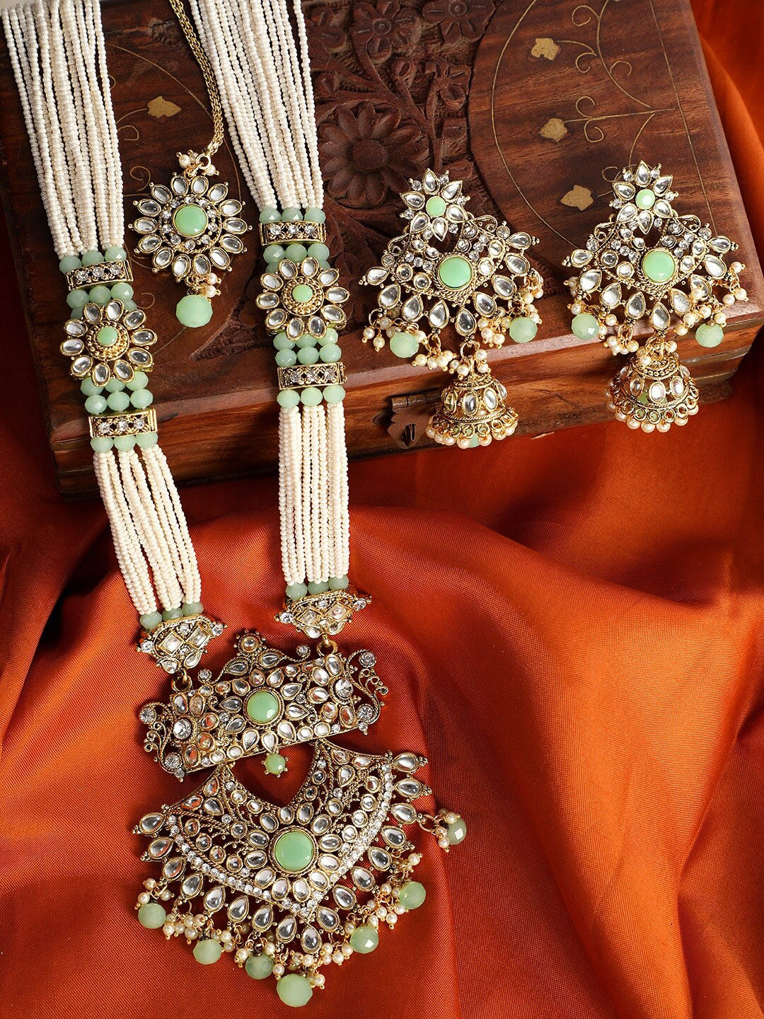 

ANIKAS CREATION Gold-Plated White & Sea Green Kundan-Studded Beaded Pearl Vilandi Jewellery Set