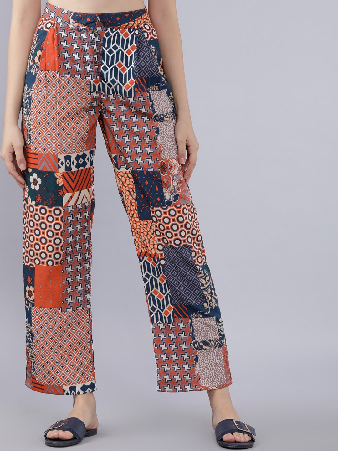 

Tokyo Talkies Women Green & Rust Brown Regular Fit Printed Regular Trousers
