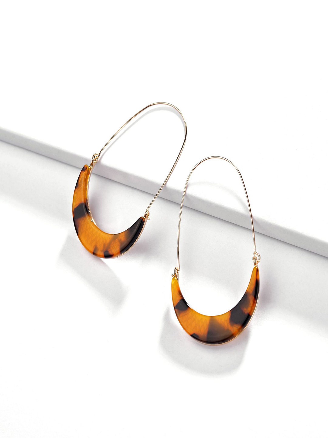 

AQUASTREET Yellow & Black Gold-Plated Crescent Shaped Leopard Acrylic Hoop Earrings