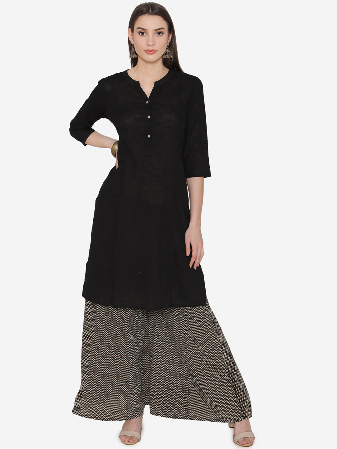 

Kifahari Women Black & Beige Solid Kurta with Palazzos