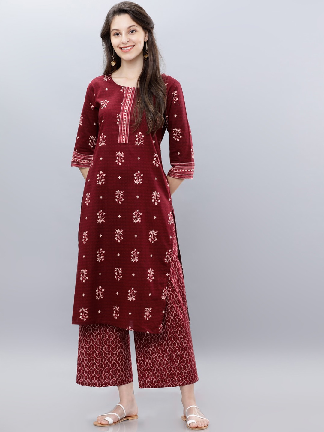 

Vishudh Women Maroon Printed Cotton Kurta with Trousers