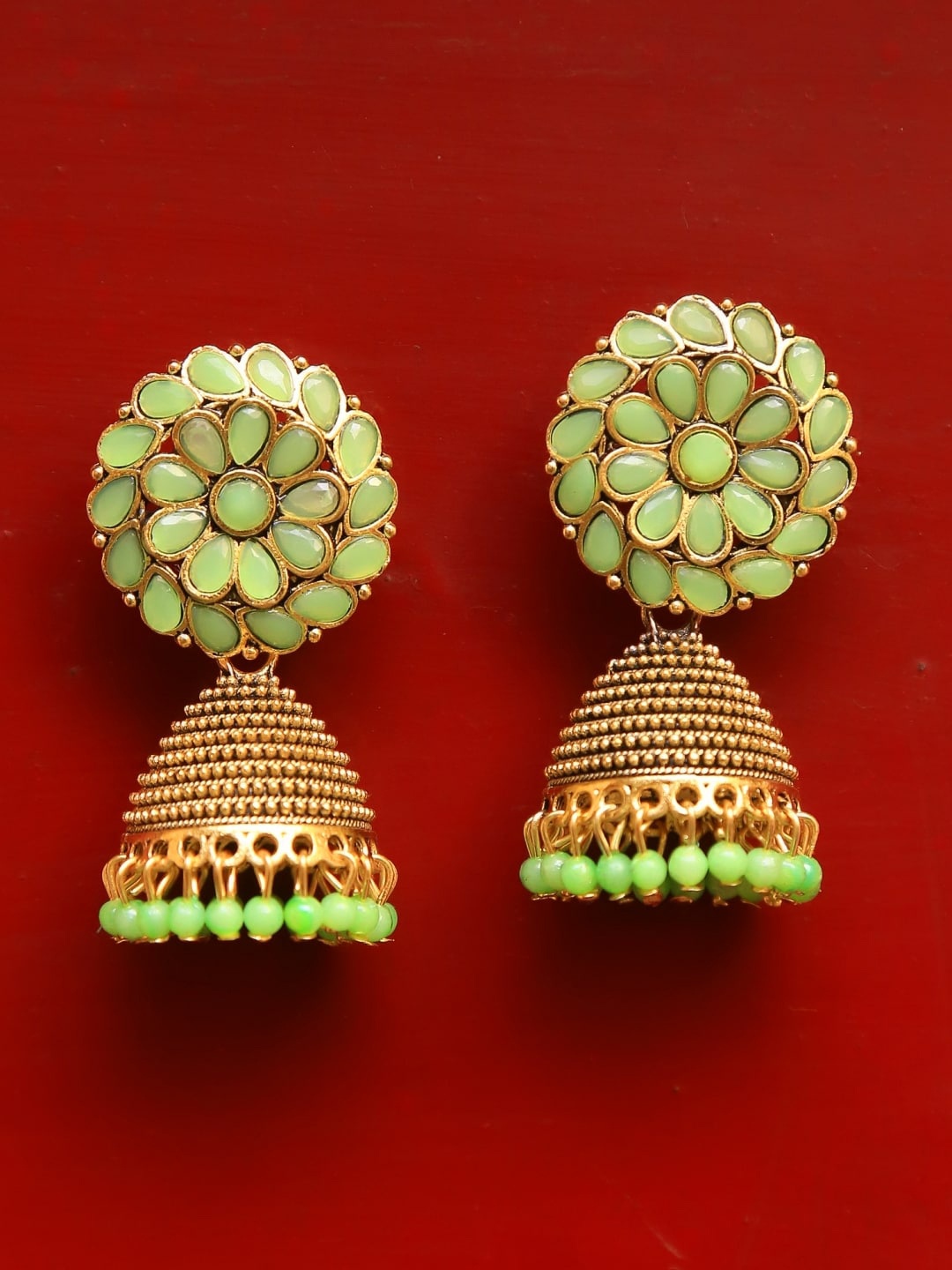 

Crunchy Fashion Green Gold-Plated Dome Shaped Jhumkas