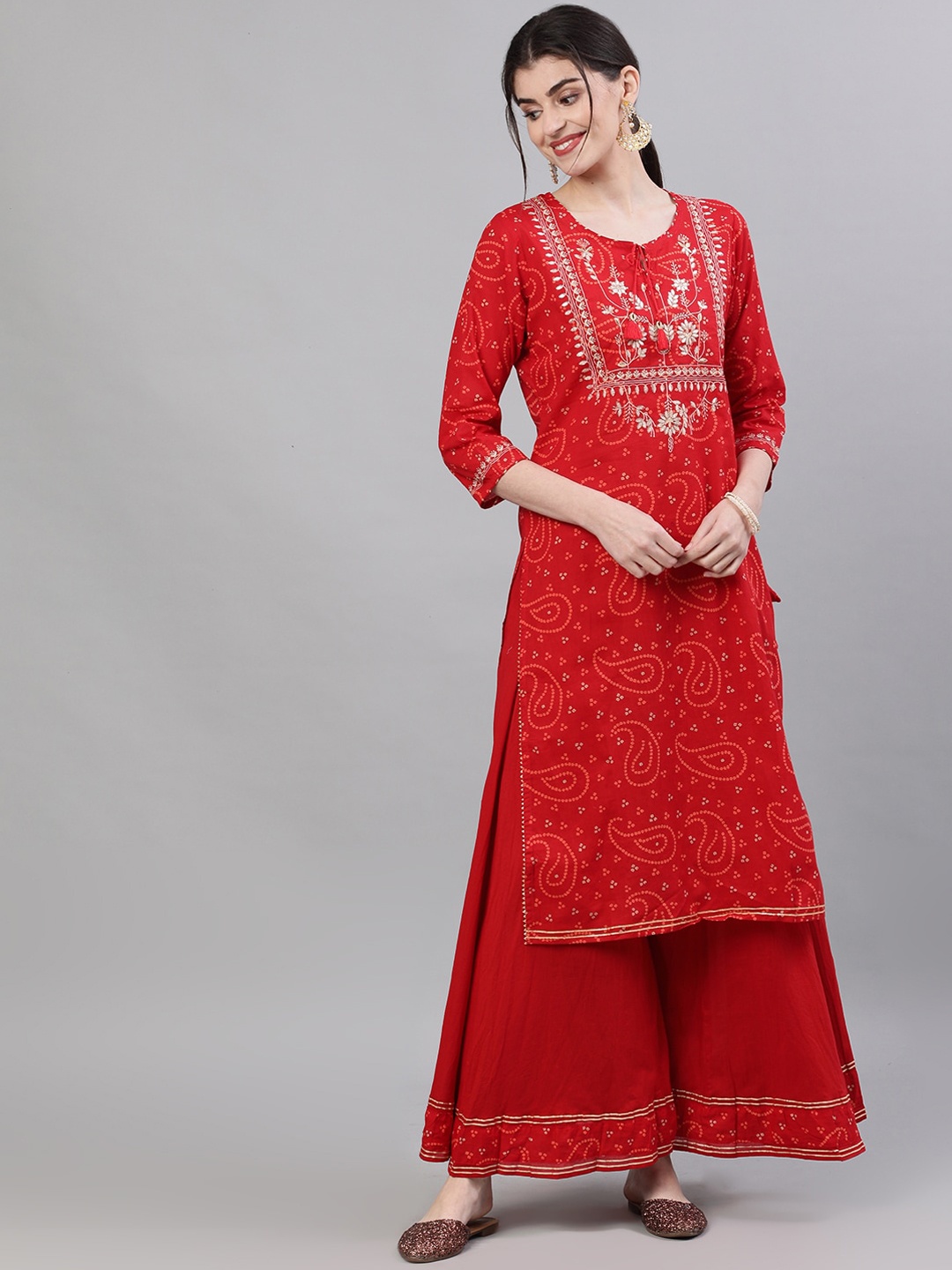 

Ishin Women Red Printed Kurta with Palazzos