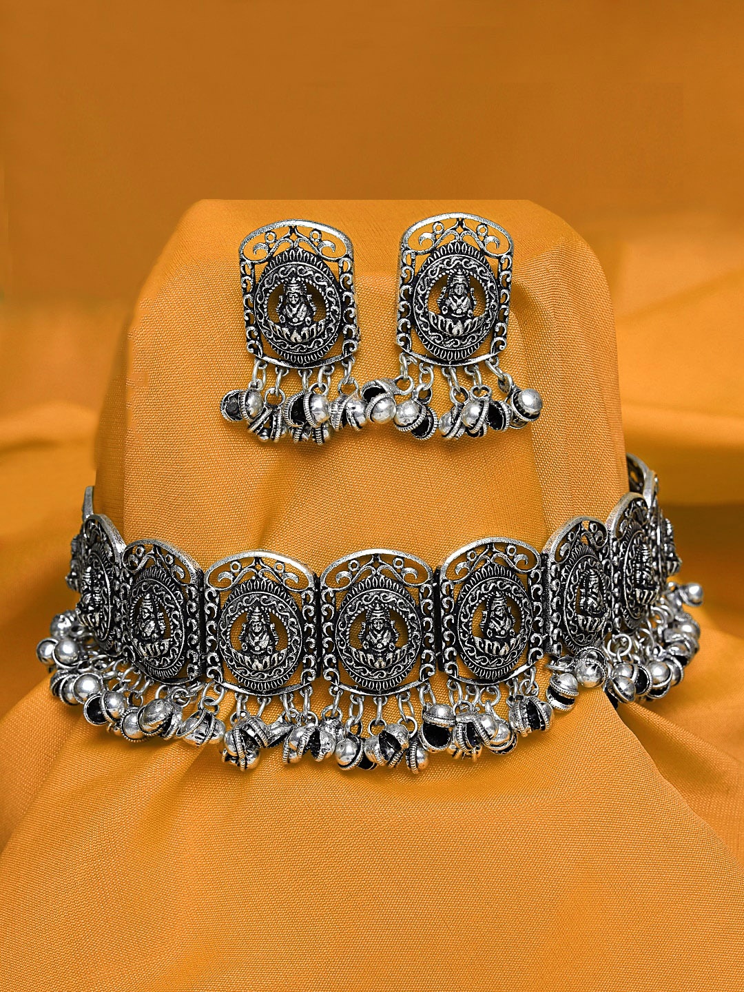 

Yellow Chimes Oxidized Silver-Plated Lakshmi Theme Ghungroo Beaded Jewellery Set
