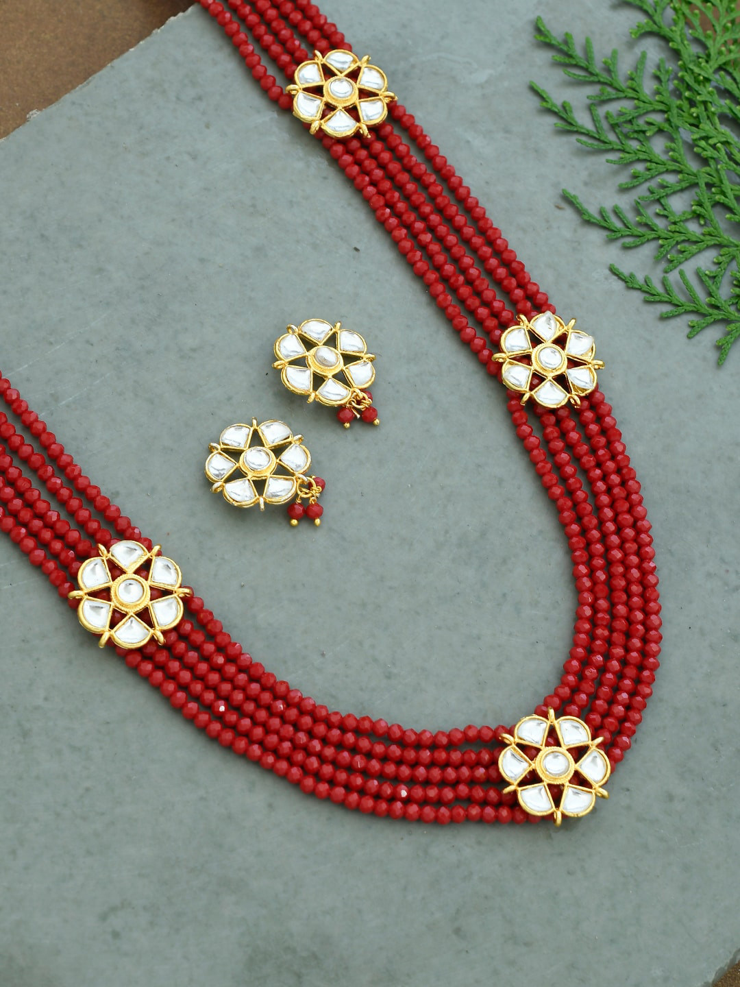 

Silvermerc Designs Women Red & Gold- Toned Brass Kundan Studded Necklace Set