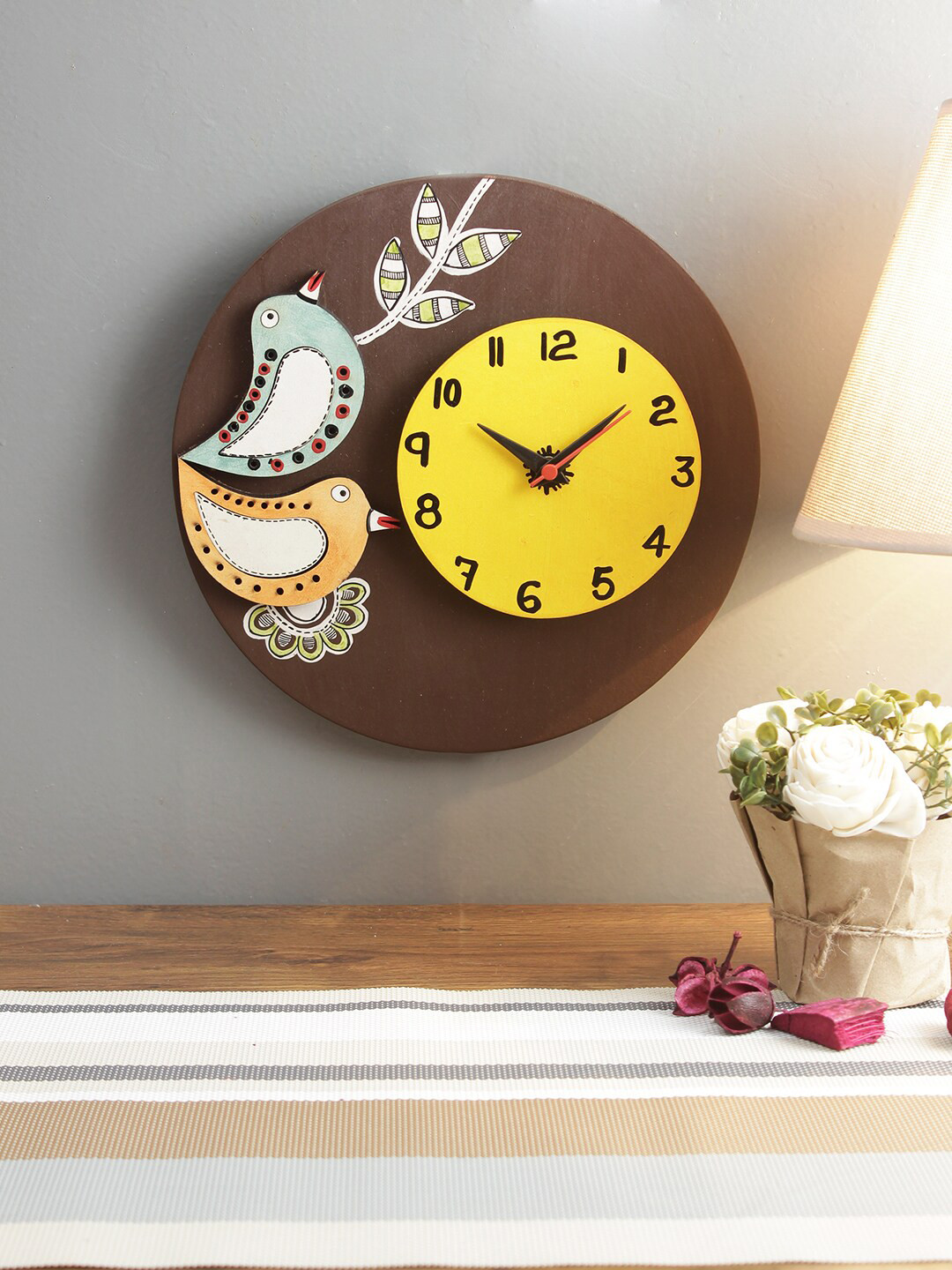 

Aapno Rajasthan Brown & Yellow Printed Handpainted Round Wooden Wall Clock