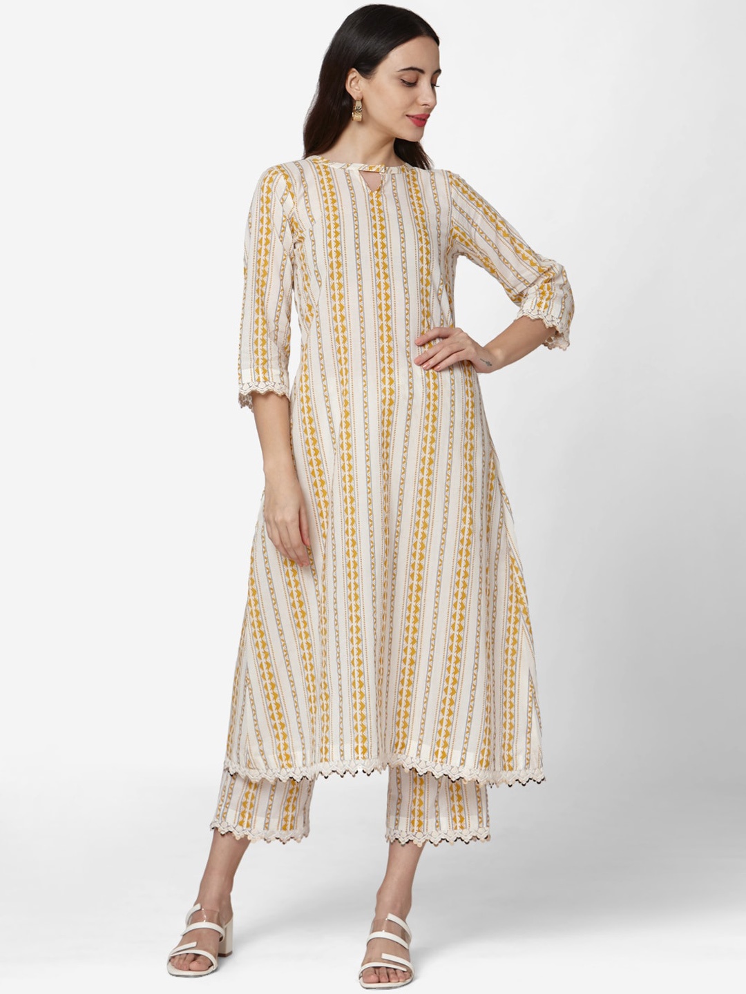

Saanjh Women Off-White & Yellow Printed Cotton Kurta with Trousers