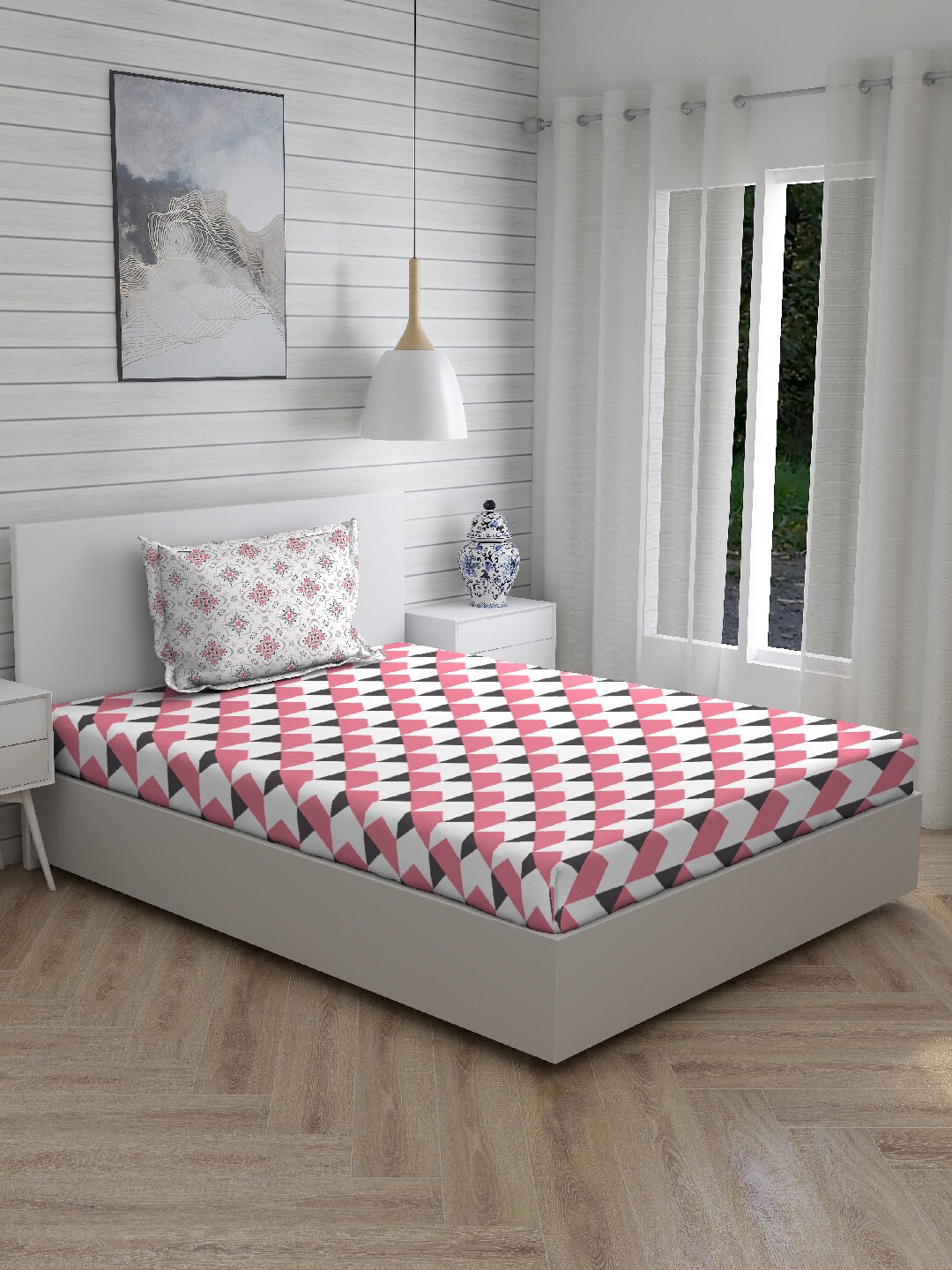 

Layers Pink & White Printed 104 TC Cotton 1 Single Bedsheet with 1 Pillow Covers