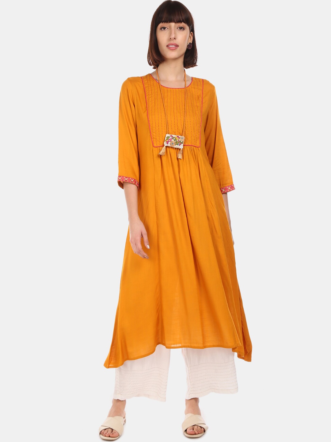 

Anahi Women Mustard Solid Anarkali Kurta